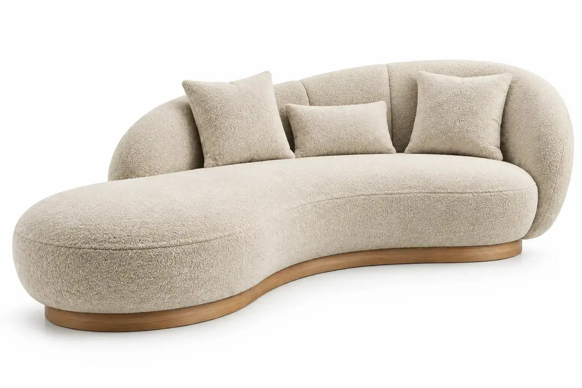 Sofá curvo tapizado de contorno redondeado, beige y marrón
